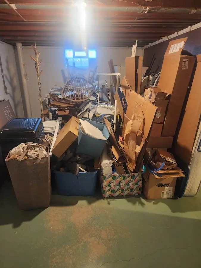 Roll-off dumpster container at job site for 6 Yard Dumpster Rental in Rose Hill